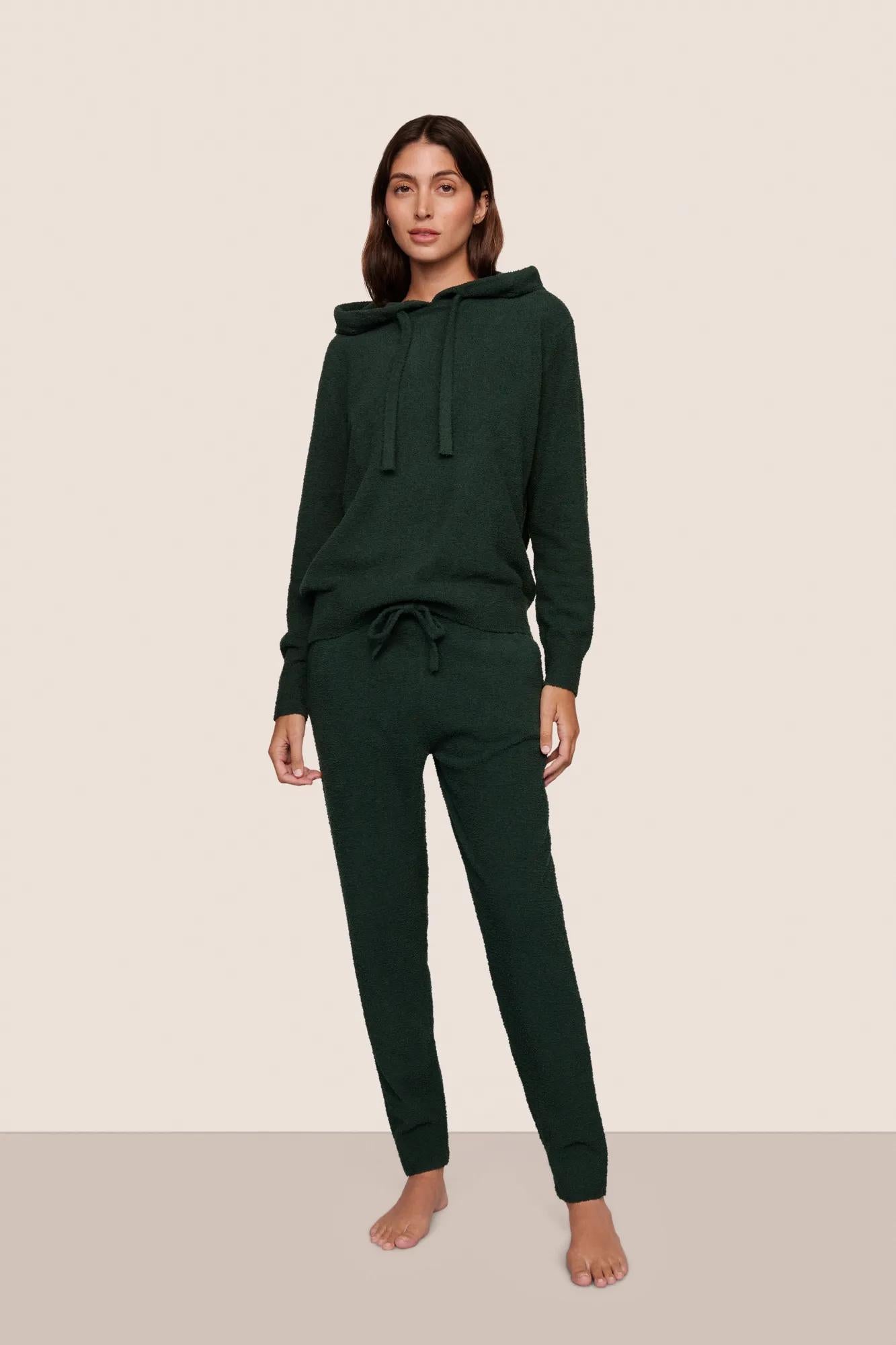 Model is wearing Recycled Boucle Hoodie  in Pine