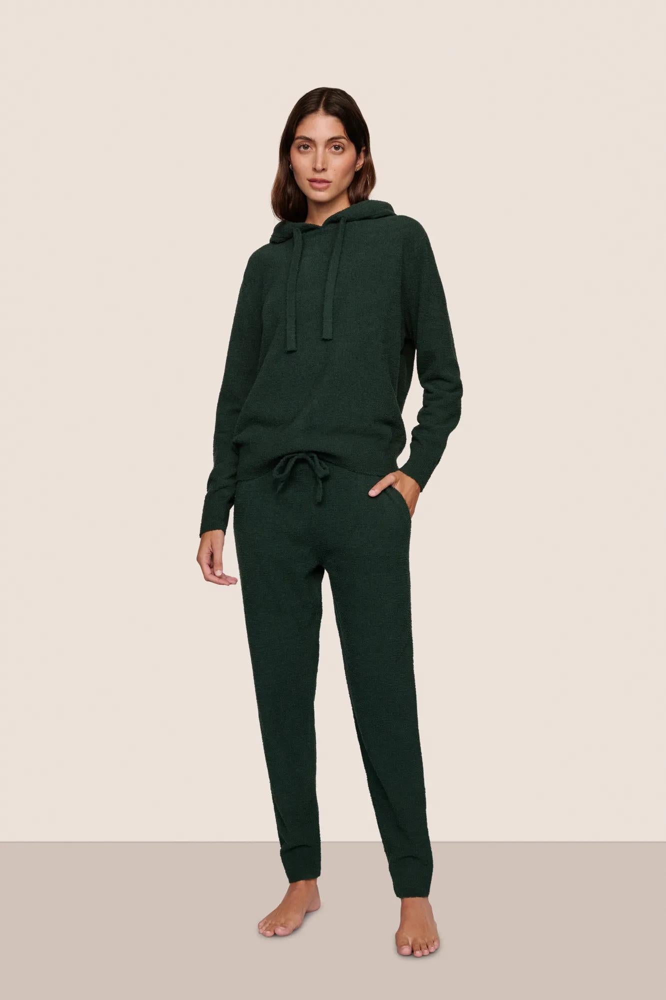 Model is wearing Recycled Boucle Hoodie  in Pine