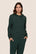 Model is wearing Recycled Boucle Hoodie  in Pine