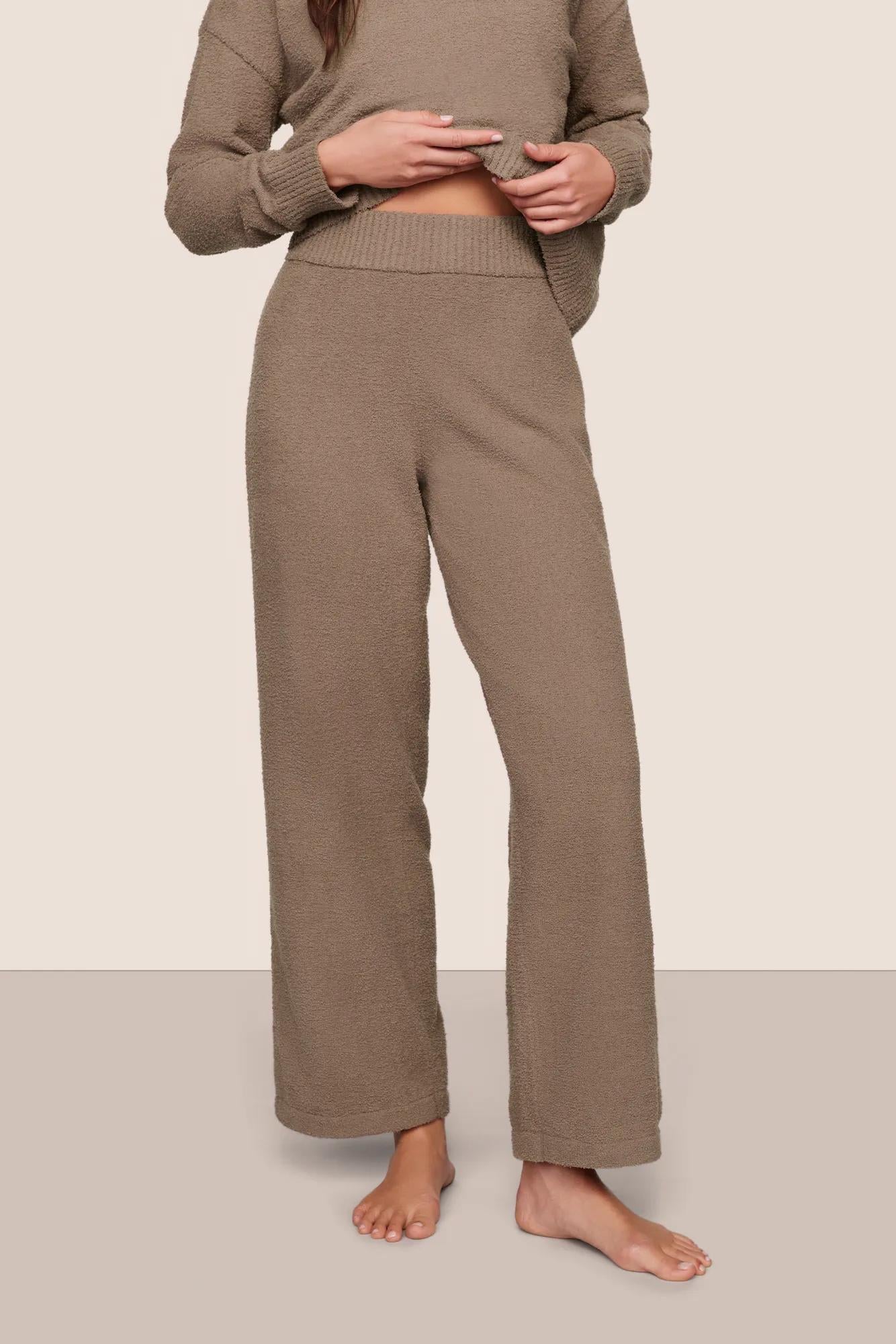 Model is wearing Recycled Boucle Pant  in Deep Taupe