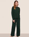 Model is wearing Recycled Boucle Crew Neck Pullover  in Pine