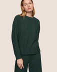 Model is wearing Recycled Boucle Crew Neck Pullover  in Pine