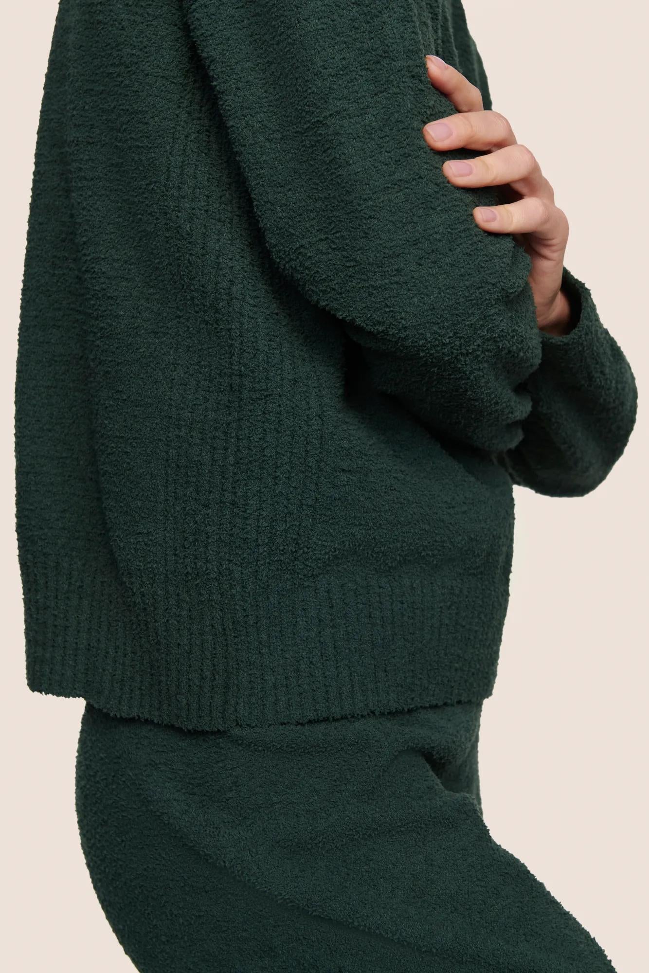 Model is wearing Recycled Boucle Crew Neck Pullover  in Pine