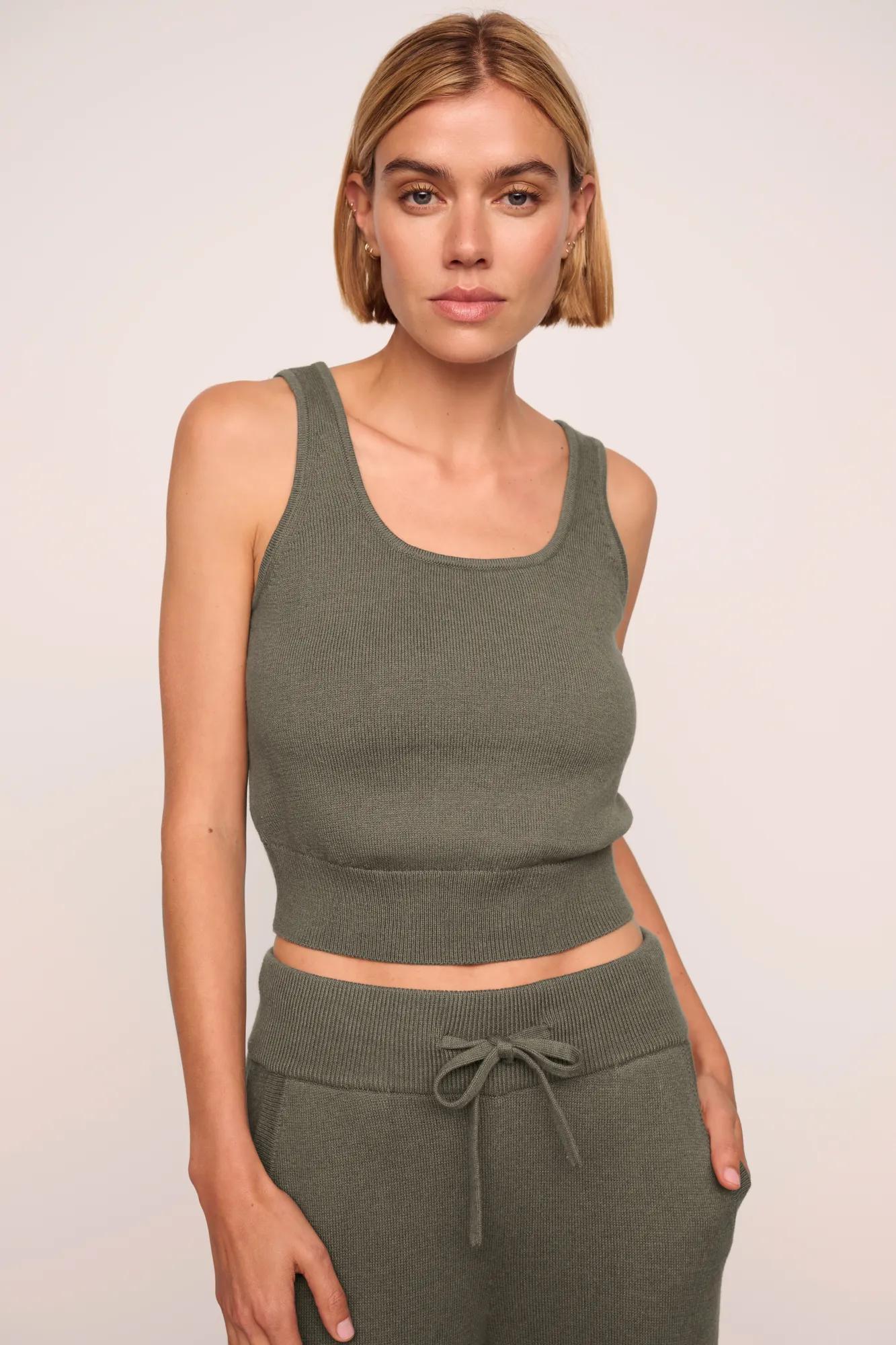 Model is wearing Recycled Sweater Cropped Tank  in Smokey Olive