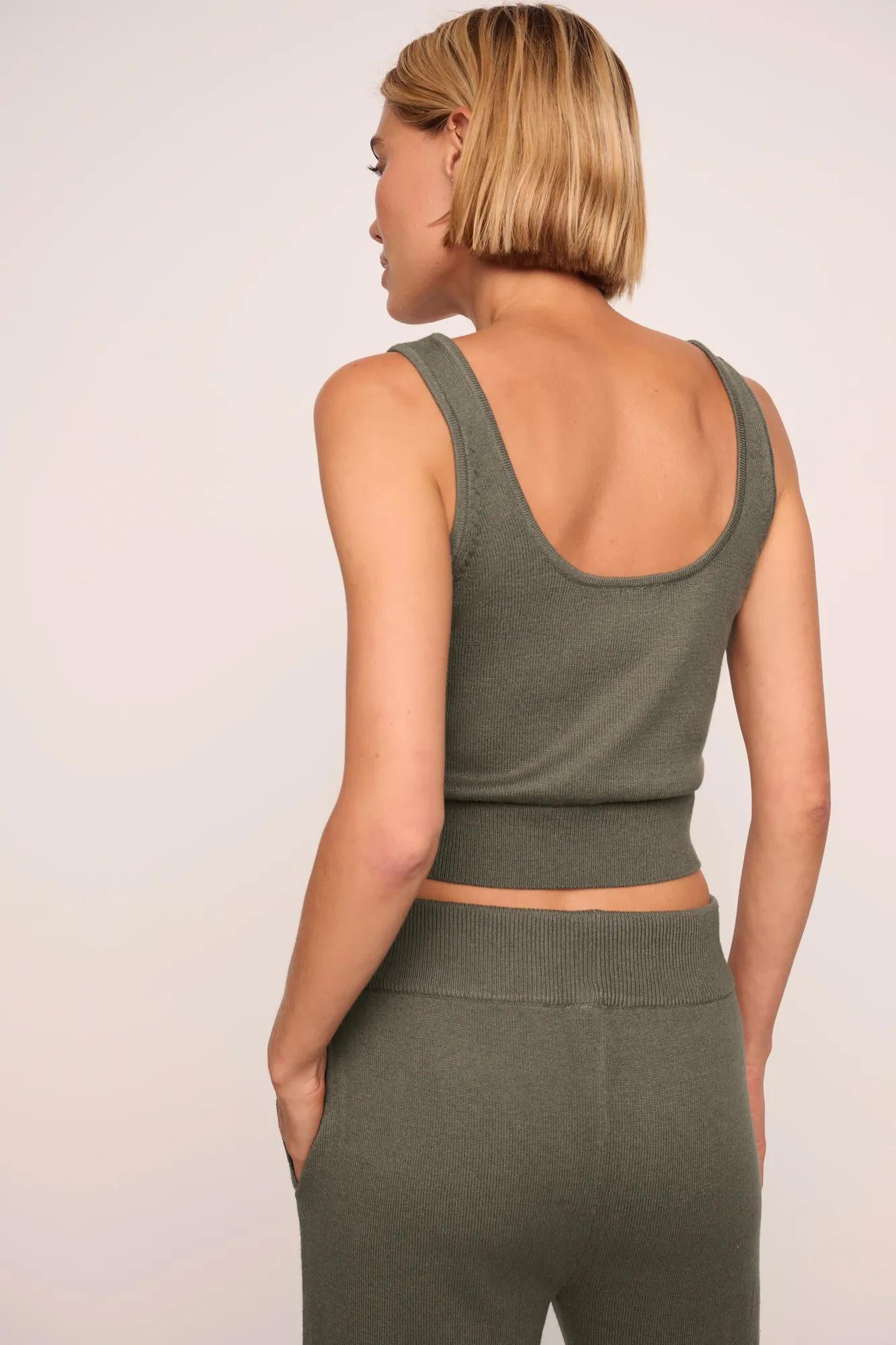 Model is wearing Recycled Sweater Cropped Tank  in Smokey Olive