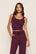 Model is wearing Recycled Sweater Cropped Tank in Wildberry