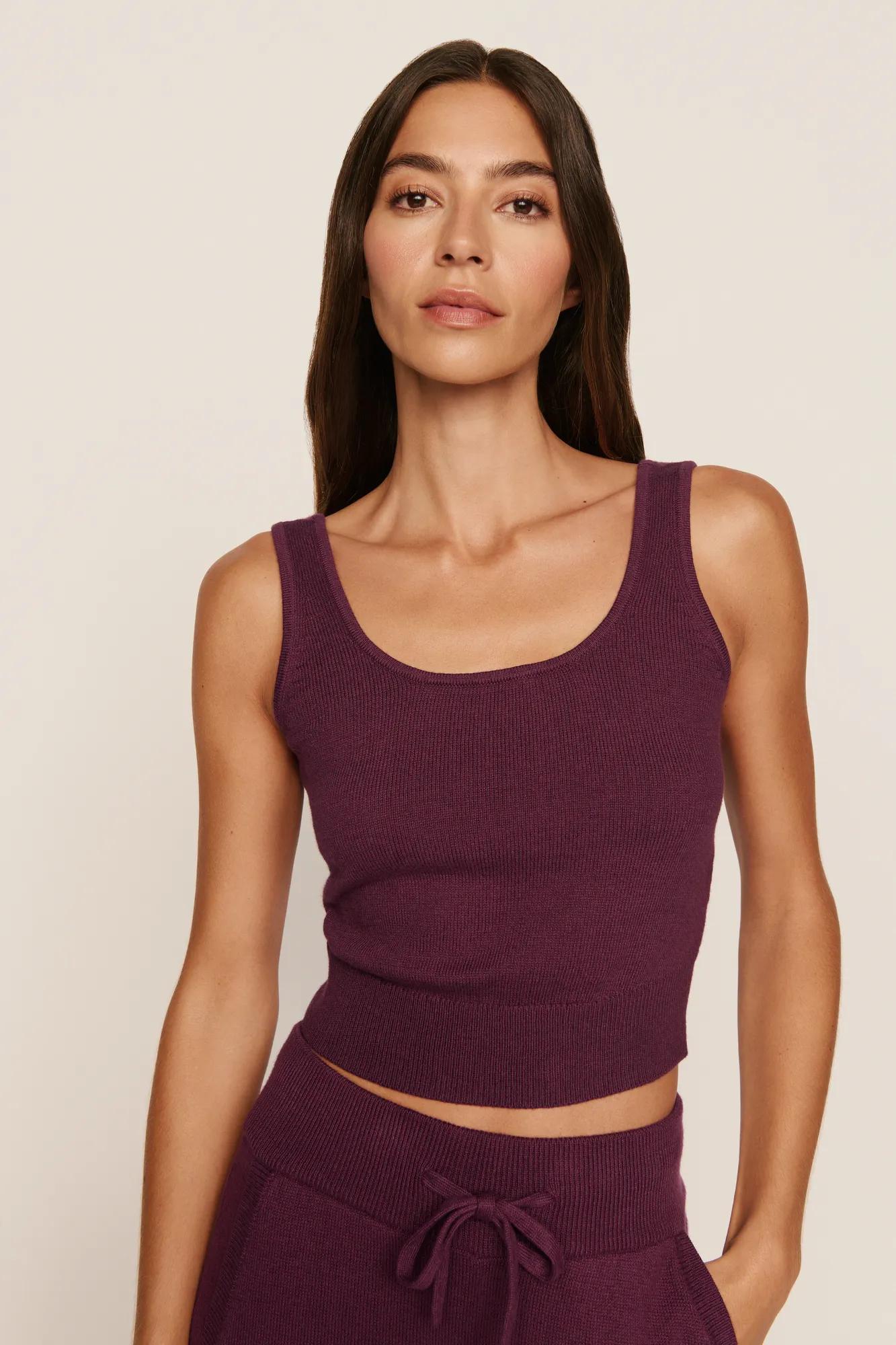 Model is wearing Recycled Sweater Cropped Tank in Wildberry