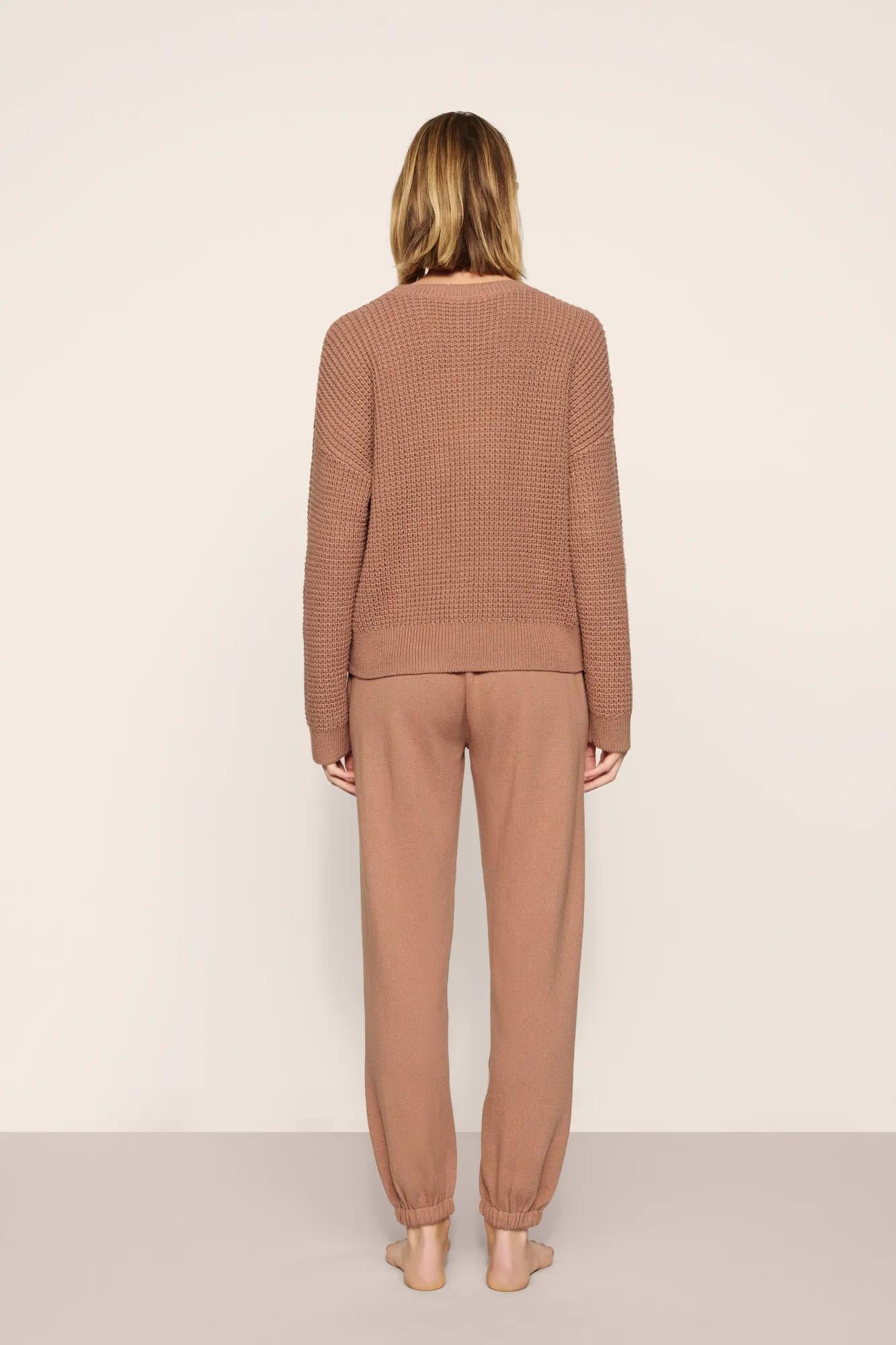 Model is wearing Recycled Sweater Slouchy Pant  in  Hazelnut