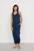 Model is wearing Aloe Cotton Tank in Navy