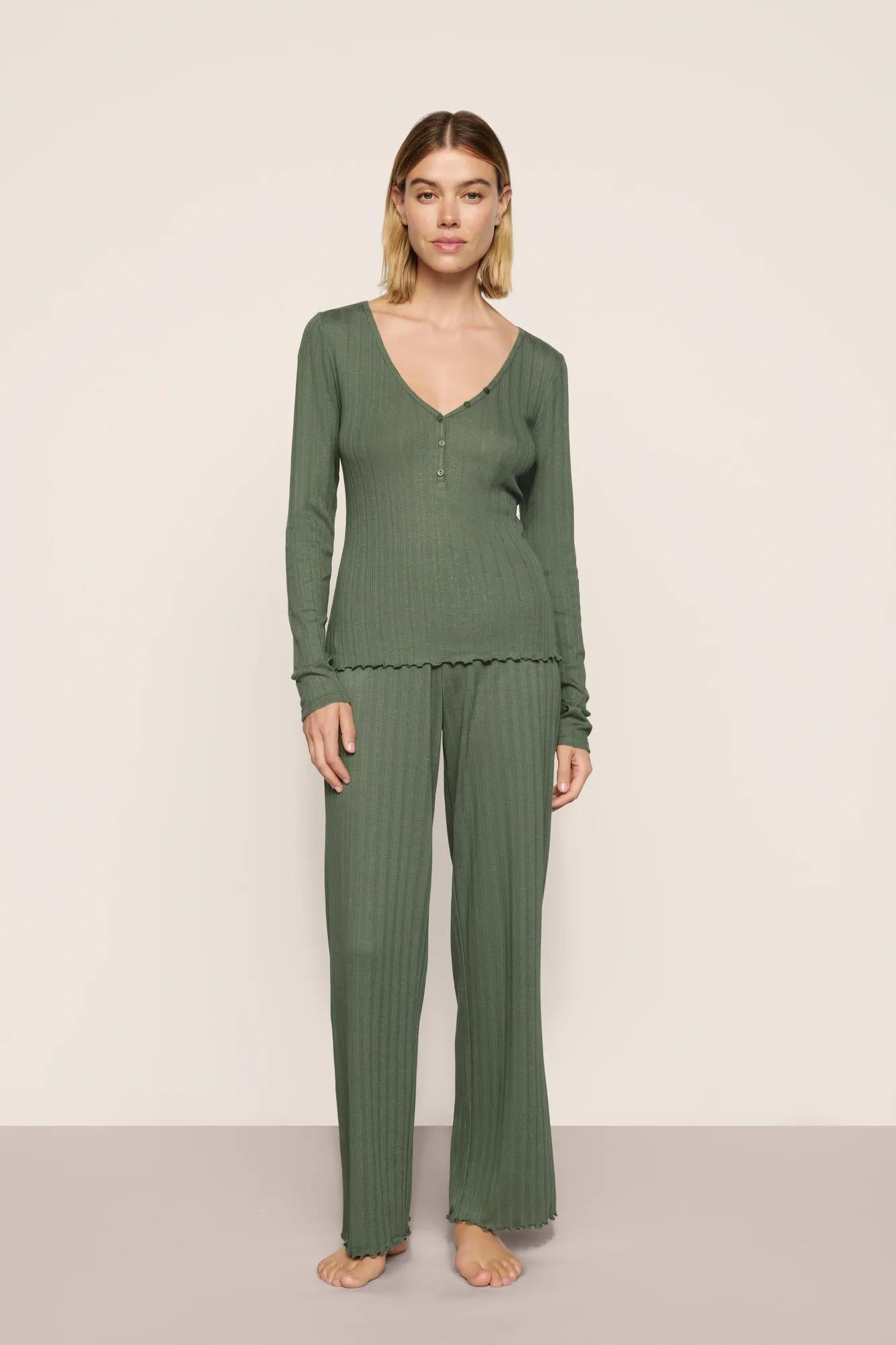 Model is wearing Pointelle V Neck Henley  in  Desert Sage