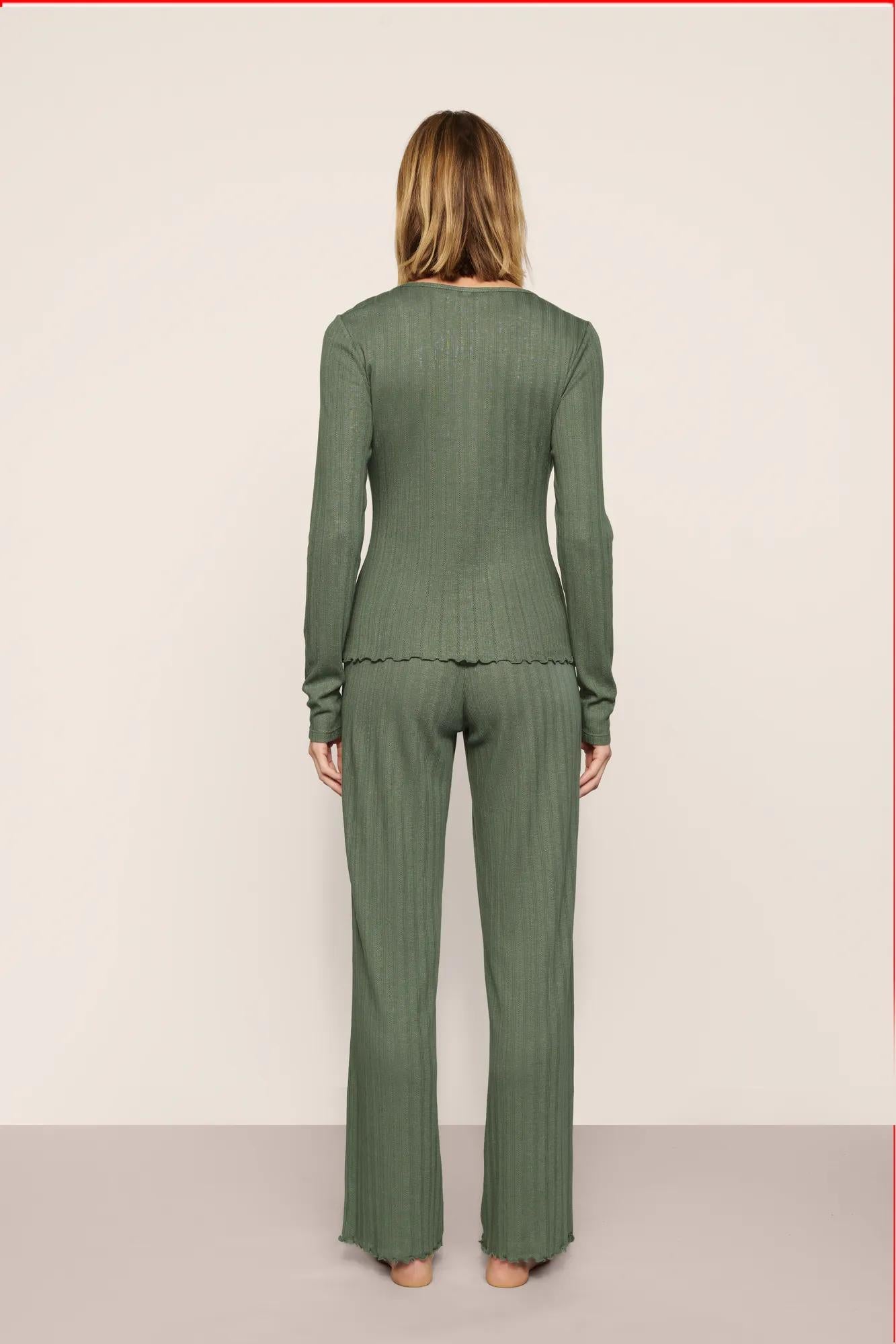 Model is wearing Pointelle V Neck Henley  in  Desert Sage