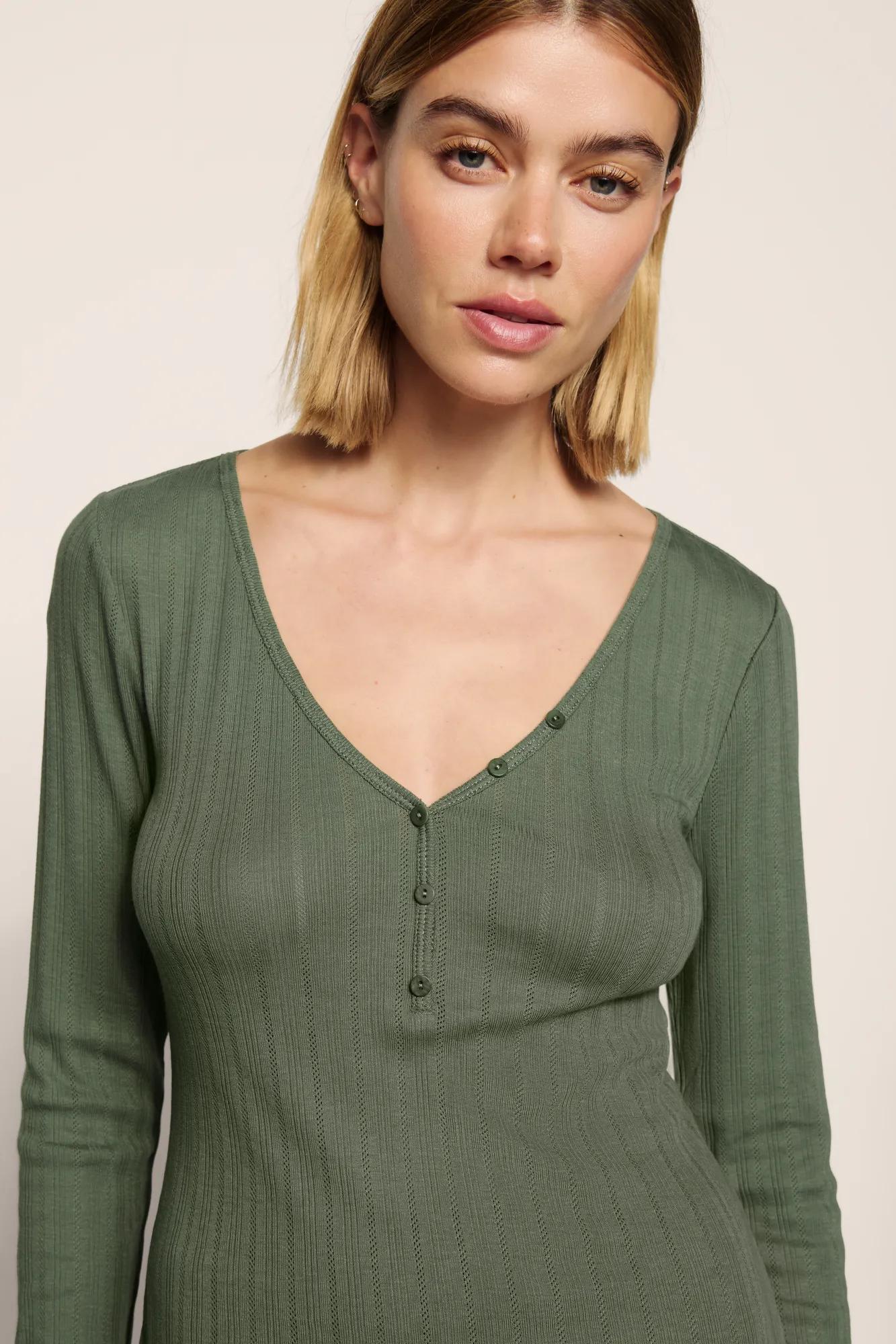 Model is wearing Pointelle V Neck Henley  in  Desert Sage