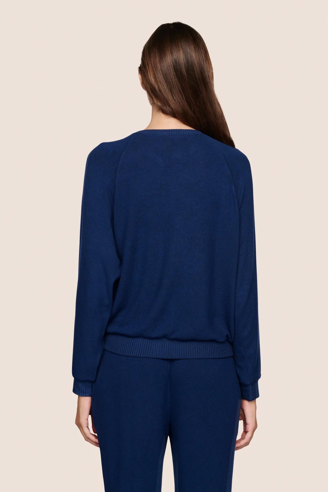 Model is wearing Cozy Time Crew Neck Pullover  in Navy