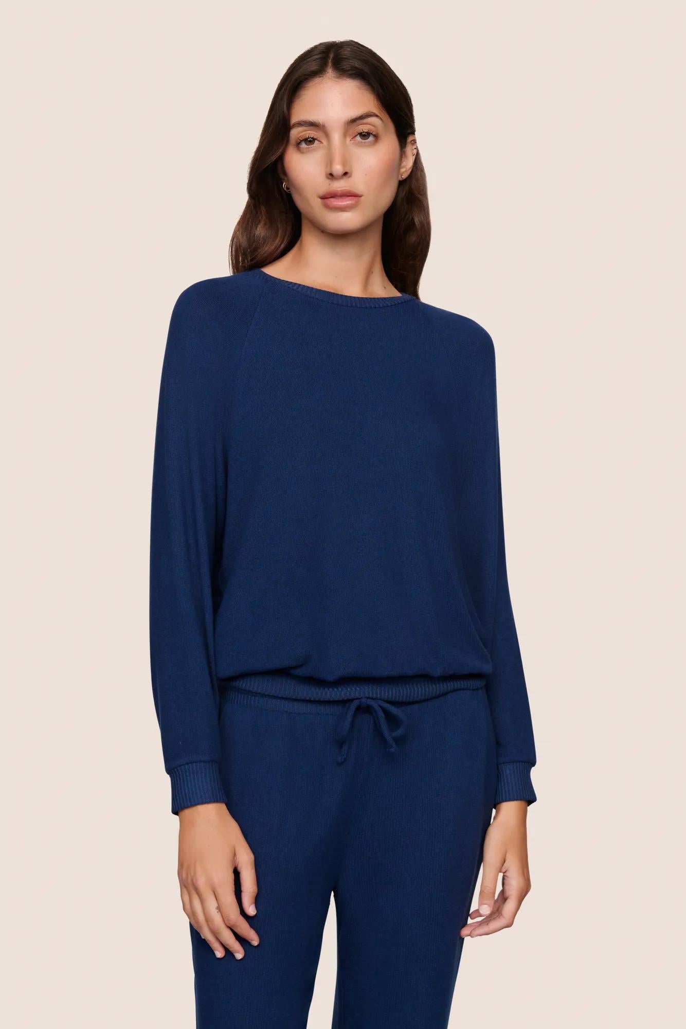 Model is wearing Cozy Time Crew Neck Pullover  in Navy