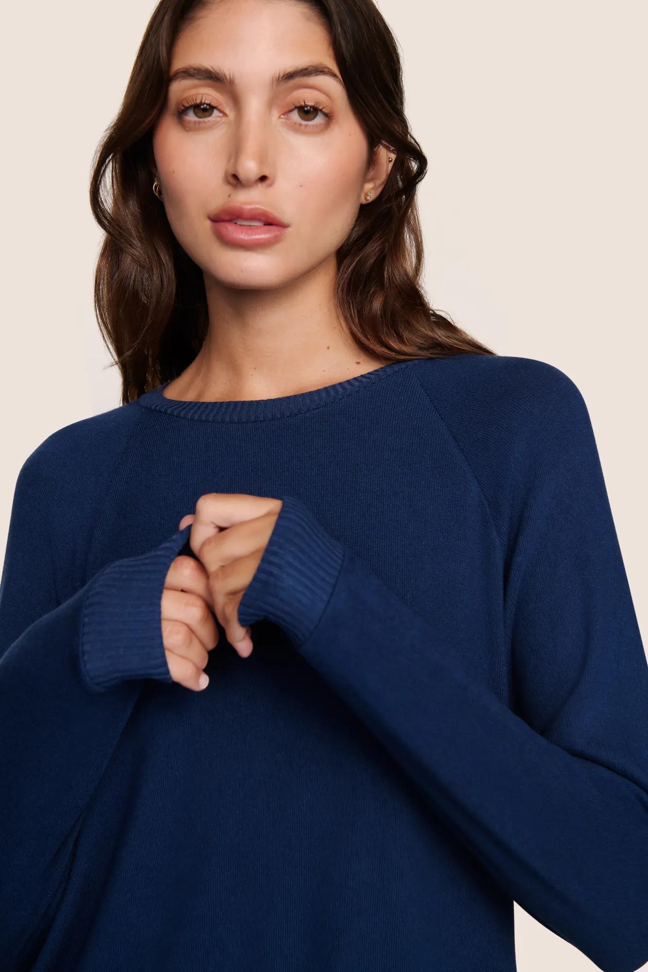 Model is wearing Cozy Time Crew Neck Pullover  in Navy