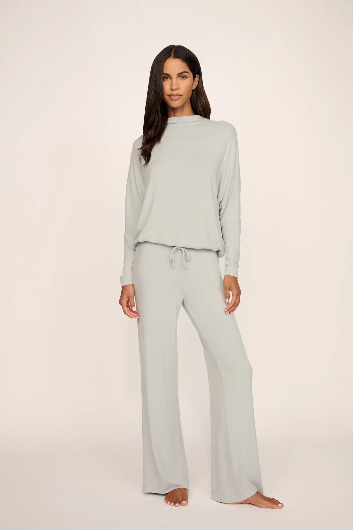 Model is wearing Cozy Time Mock Neck Pullover in Blue Mist
