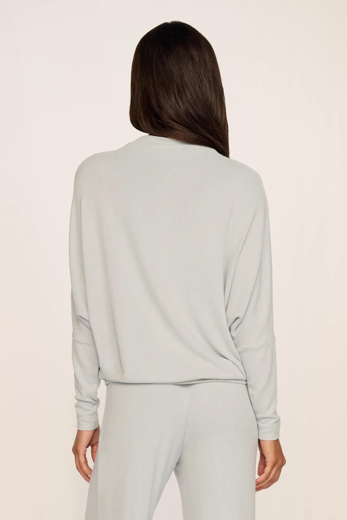 Model is wearing Cozy Time Mock Neck Pullover in Blue Mist