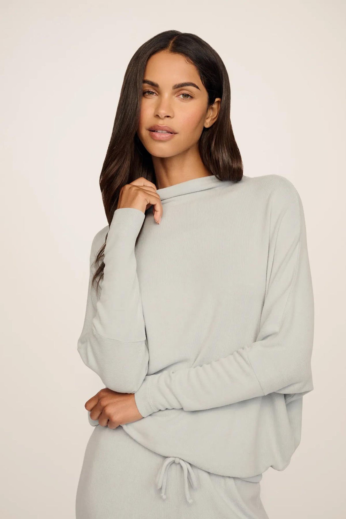 Model is wearing Cozy Time Mock Neck Pullover in Blue Mist