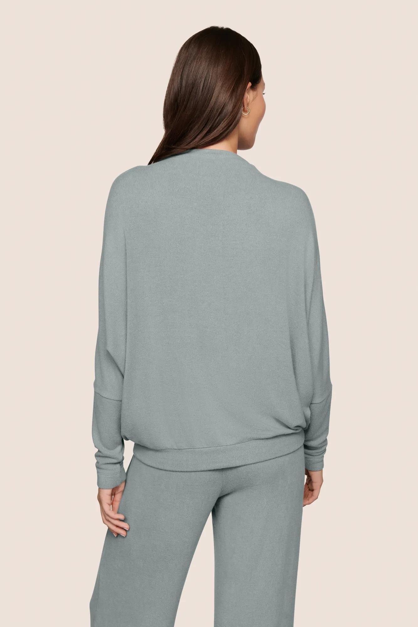 Model is wearing Cozy Time Mock Neck Pullover  in Lead