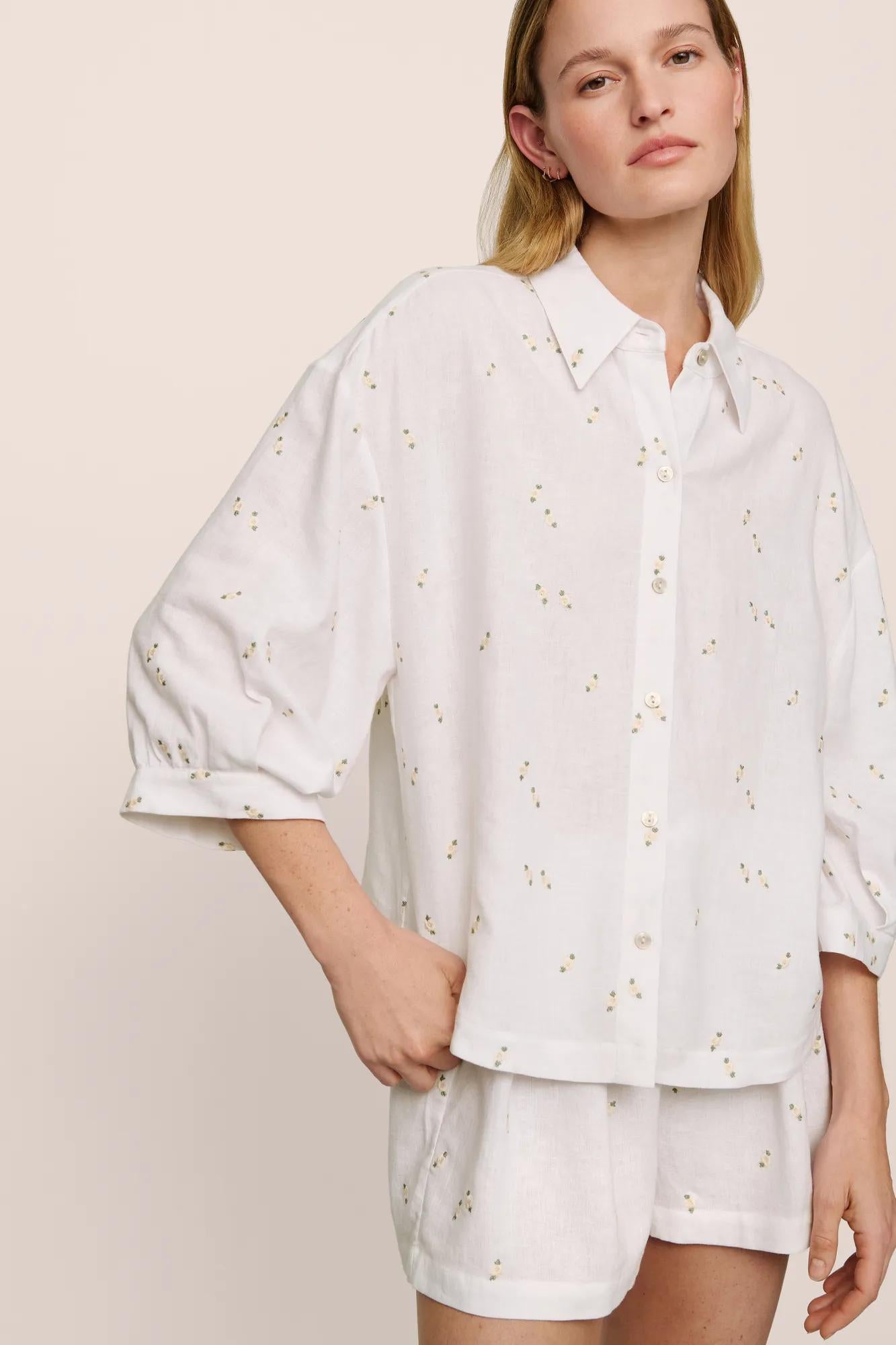 Model is wearing Linen Blend Relaxed Quarter Sleeve Top in SummerDaisyWhite/PeachDust