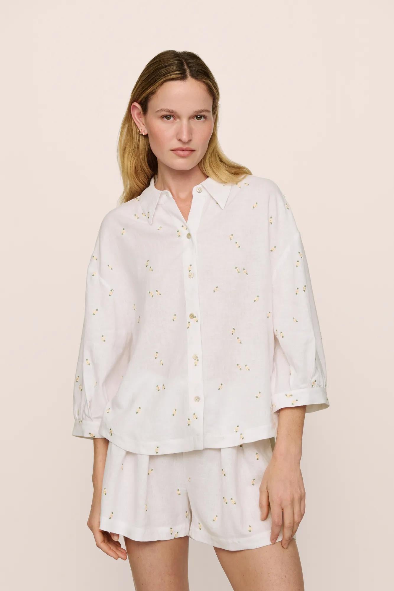 Model is wearing Linen Blend Relaxed Quarter Sleeve Top in SummerDaisyWhite/PeachDust