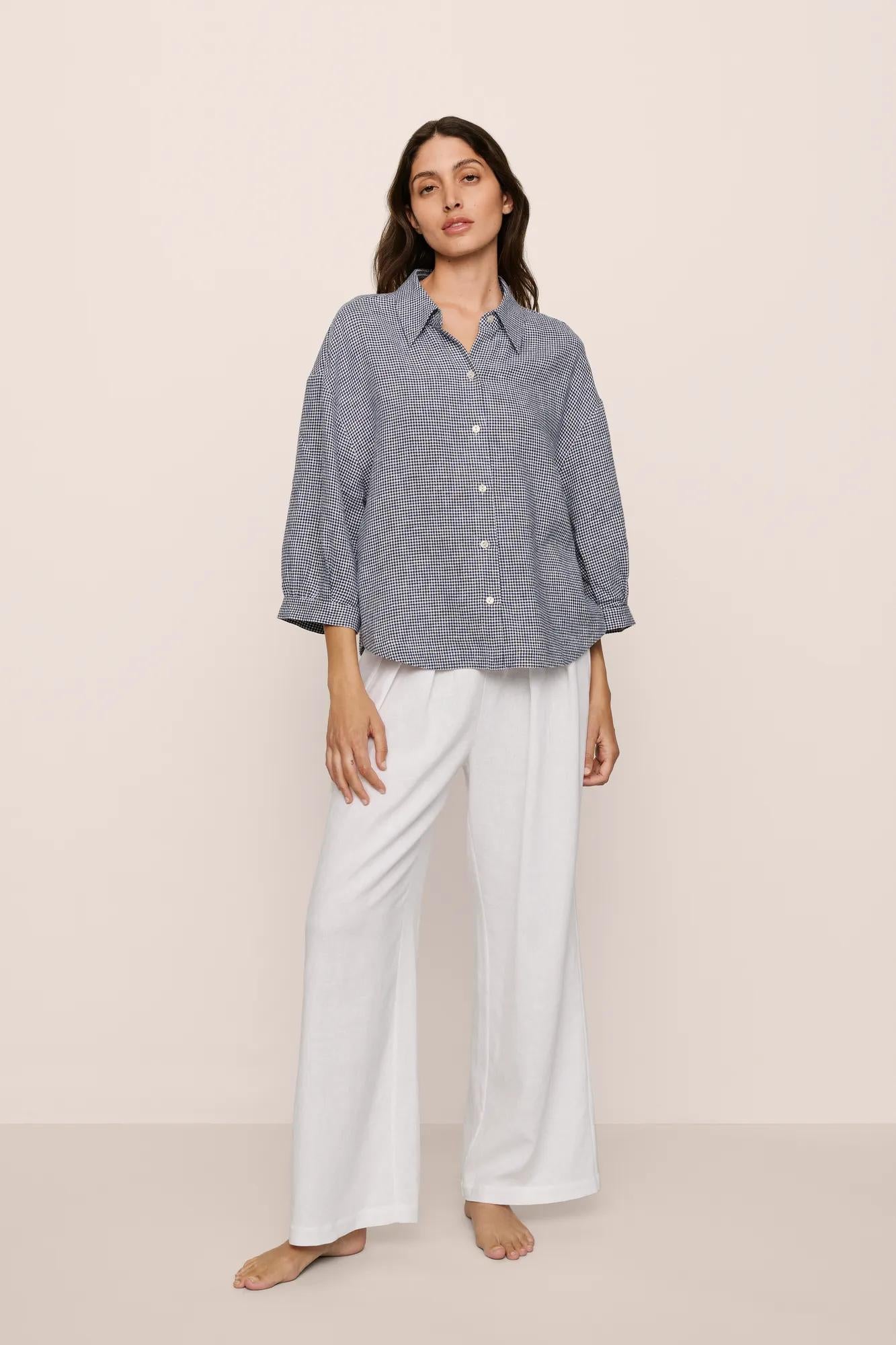 Model is wearing Linen Blend Relaxed Quarter Sleeve Top in GinghamWhite/Navy