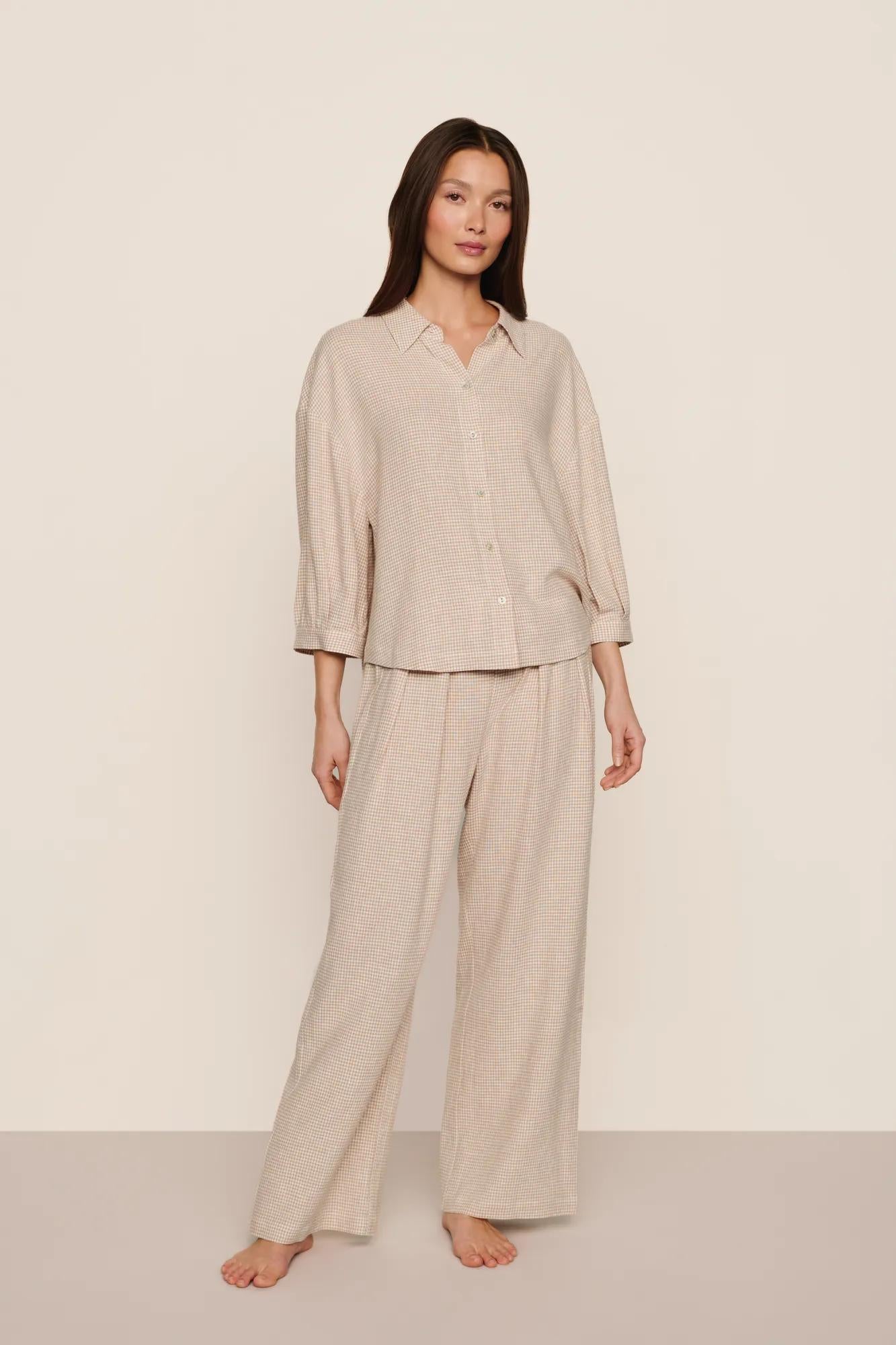 Model is wearing Linen Blend Relaxed Quarter Sleeve Top in Gingham White/Warm Taupe