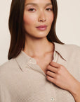 Model is wearing Linen Blend Relaxed Quarter Sleeve Top in Gingham White/Warm Taupe