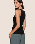 Model is wearing Essential Rib Tank  in Black