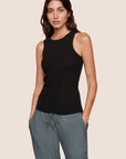 Model is wearing Essential Rib Tank  in Black