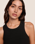 Model is wearing Essential Rib Tank  in Black