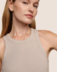Model is wearing Essential Rib Tank  in Beige