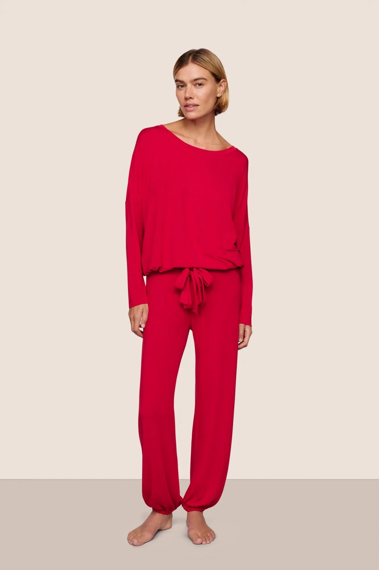 Model is wearing Gisele TENCEL™ Modal Slouchy PJ Set  in Holly Red/Holly Red