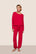 Model is wearing Gisele TENCEL™ Modal Slouchy PJ Set  in Holly Red/Holly Red
