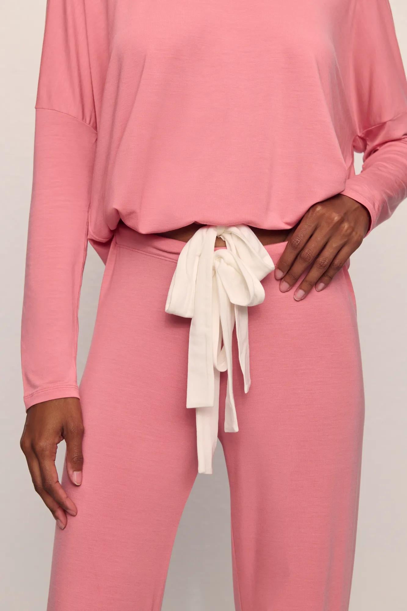 Model is wearing Gisele TENCEL™ Modal Slouchy PJ Set in  Sunkissed Coral/Ivory