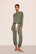 Model is wearing Gisele TENCEL™ Modal Slouchy PJ Set  in Smokey Olive/Ivory
