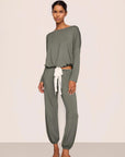 Model is wearing Gisele TENCEL™ Modal Slouchy PJ Set  in Smokey Olive/Ivory