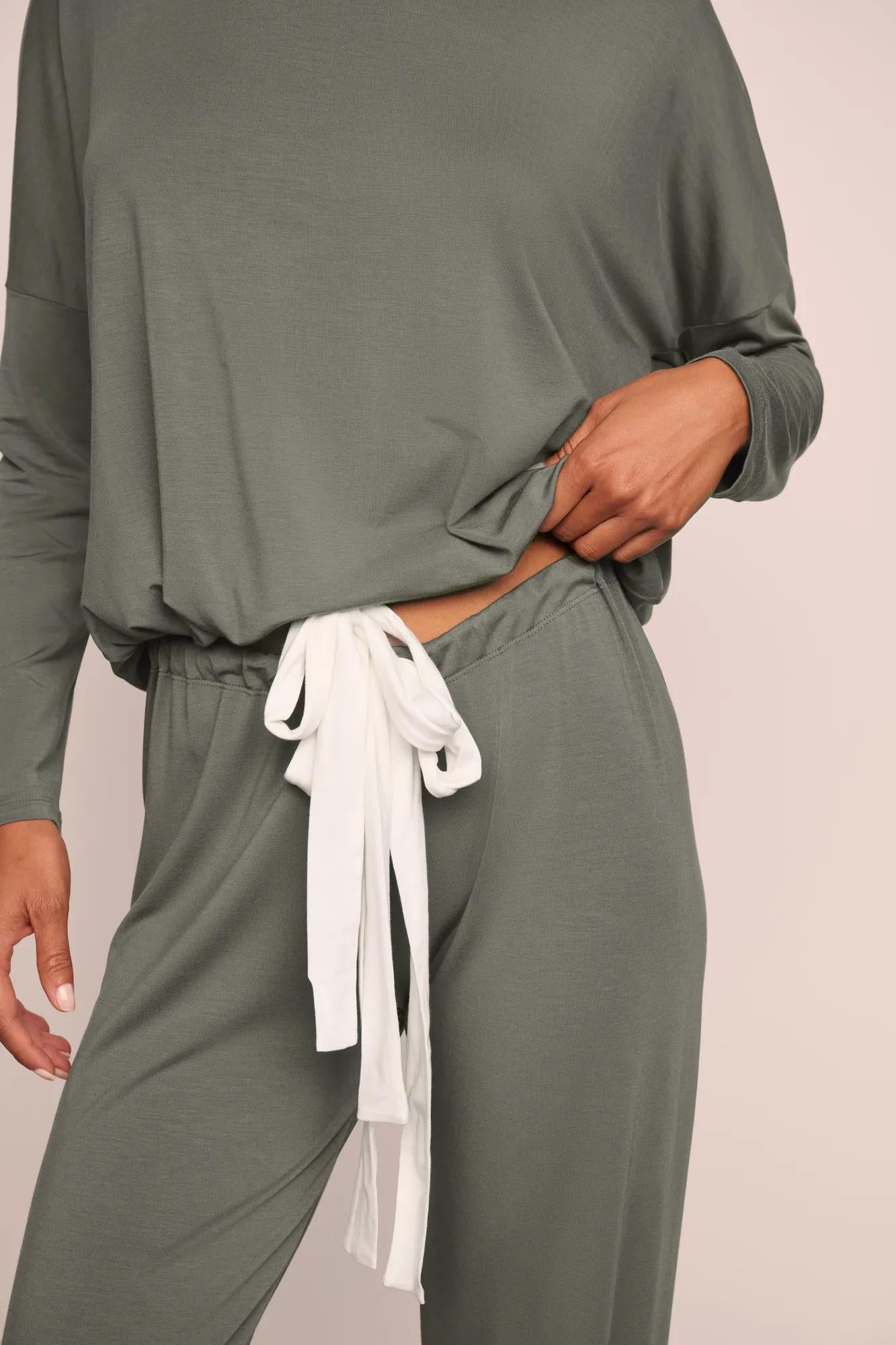 Model is wearing Gisele TENCEL™ Modal Slouchy PJ Set  in Smokey Olive/Ivory