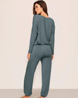Model is wearing Gisele TENCEL™ Modal Slouchy PJ Set  in  Stone Blue/Ivory