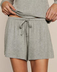 Model is wearing Dream Rib Relaxed Short in Dark Heather Grey