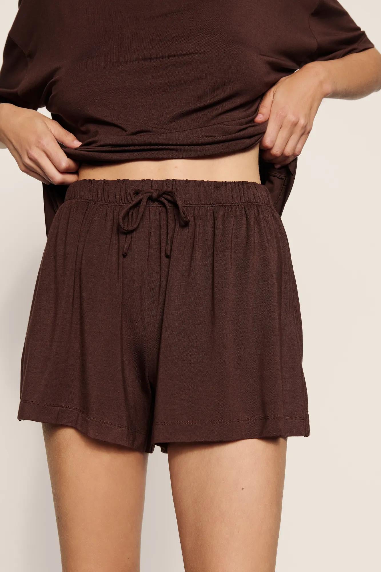 Model is wearing Gisele TENCEL™ Modal Everyday Relaxed Short in Chocolate