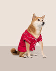 Model is wearing Gisele Printed TENCEL™ Modal Pet PJ  in Nutcracker Holly Red/Ivory