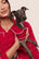 Model is wearing Gisele Printed TENCEL™ Modal Pet PJ  in Nutcracker Holly Red/Ivory