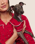 Model is wearing Gisele Printed TENCEL™ Modal Pet PJ  in Nutcracker Holly Red/Ivory