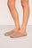 Model is wearing Sherpa Slipper  in  Warm Taupe