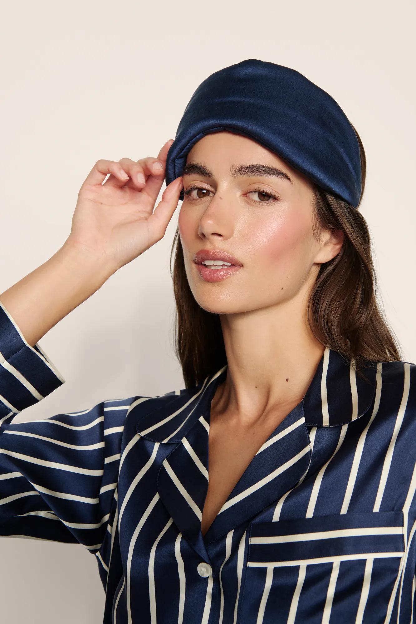 Model is wearing Inez Washable Silk Eye Mask in Navy