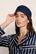 Model is wearing Inez Washable Silk Eye Mask in Navy