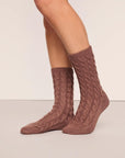 Model is wearing Cozy Socks in Deep Taupe