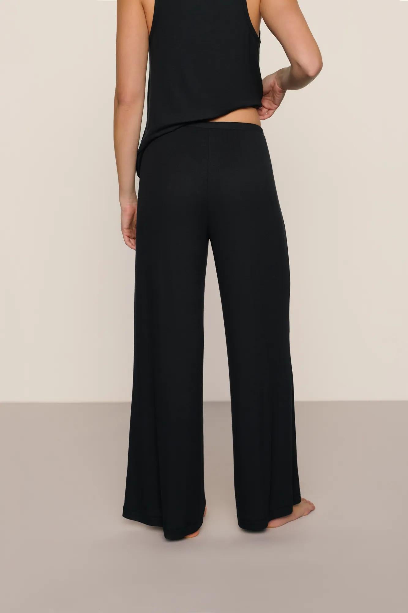 Model is wearing Dream Rib Wide Leg Pant in Black