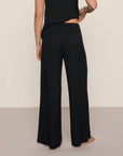 Model is wearing Dream Rib Wide Leg Pant in Black